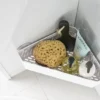 P-87213239811676-20260405174434.webp Unyqoos® Minimalistische hoekplank voor badkameropslag met zuignappen
