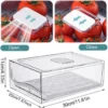 P-87213588003033-20260406095501.webp Unyqoos® Transparante en stapelbare koelkastopbergdoos met afdruipmand en handgreep